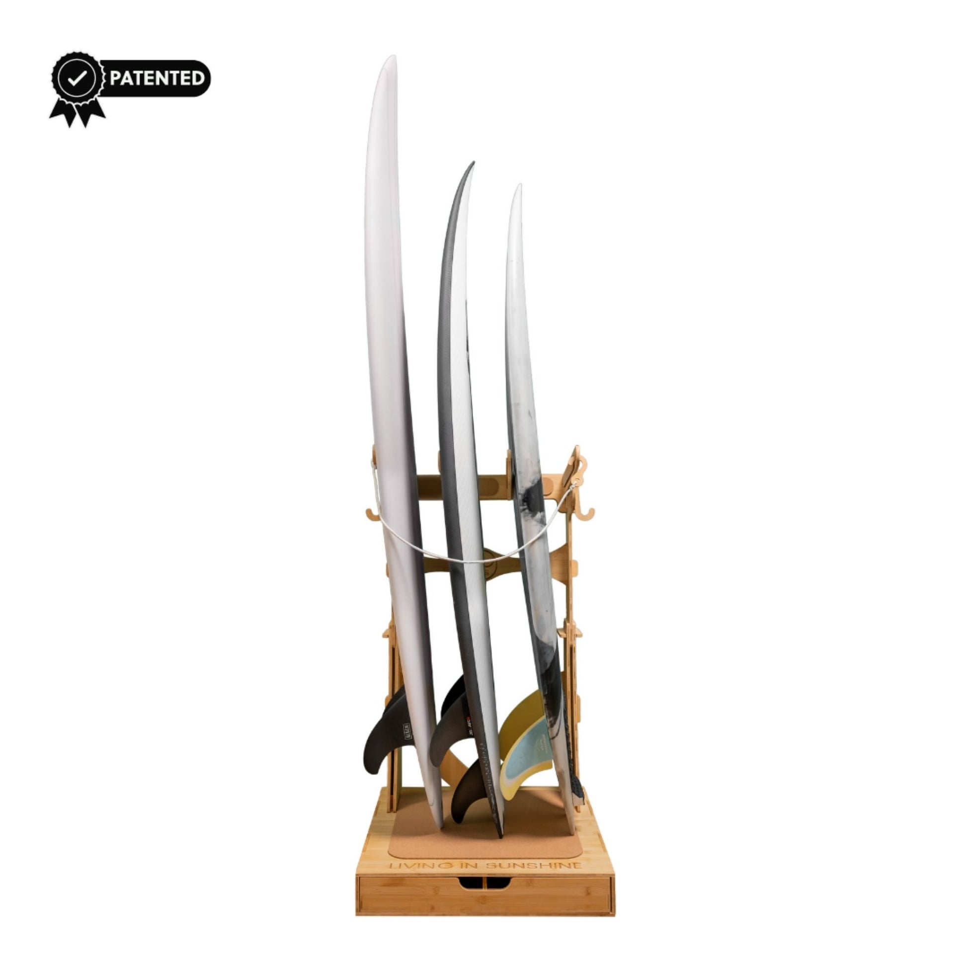 Assembled Spirit Rack holding three surfboards, showing front view with patented badge.