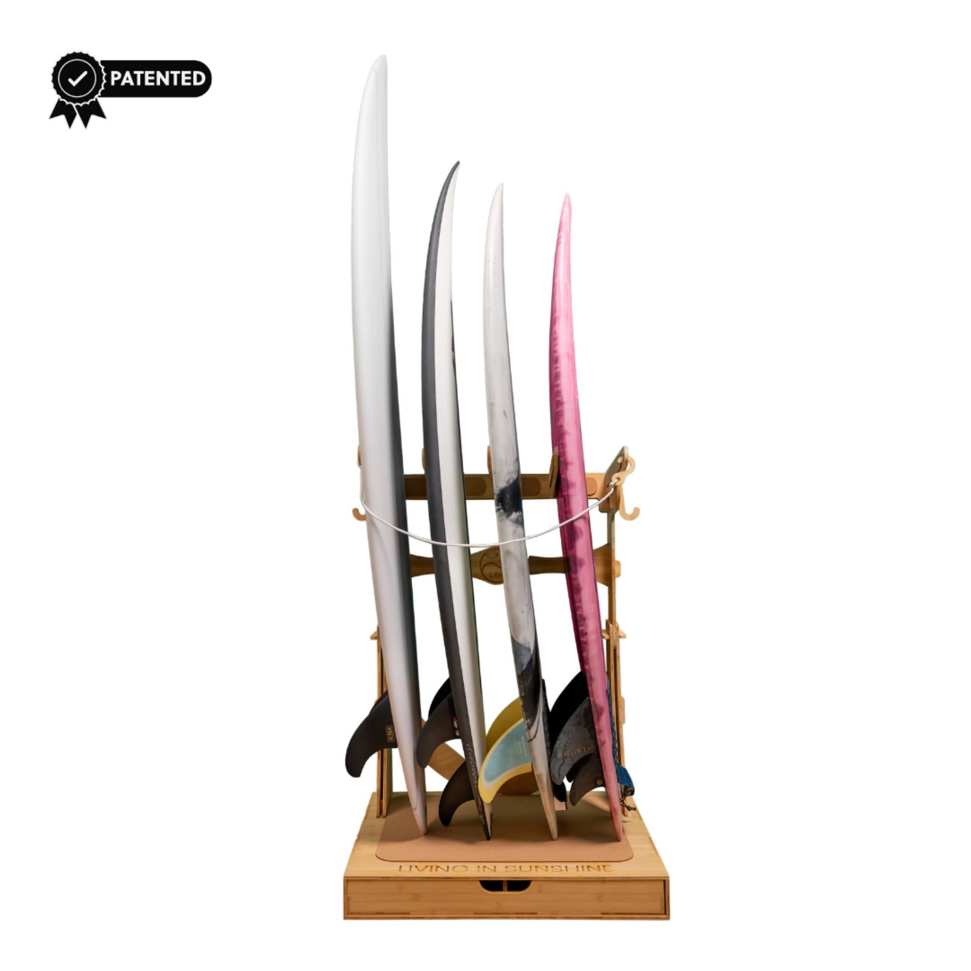 Spirit Rack holding 4 boards, incl. pink surfboard, front-facing with badge.