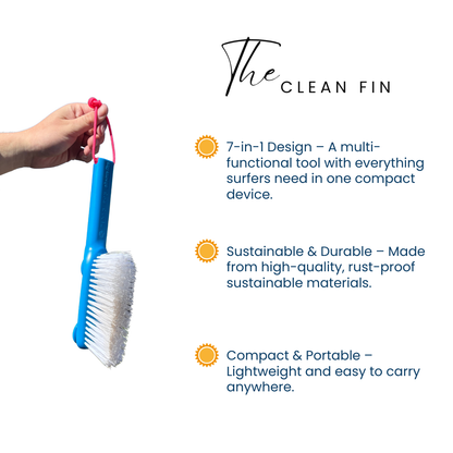Hand holding The Clean Fin, a blue 7-in-1 sustainable surf cleaning tool