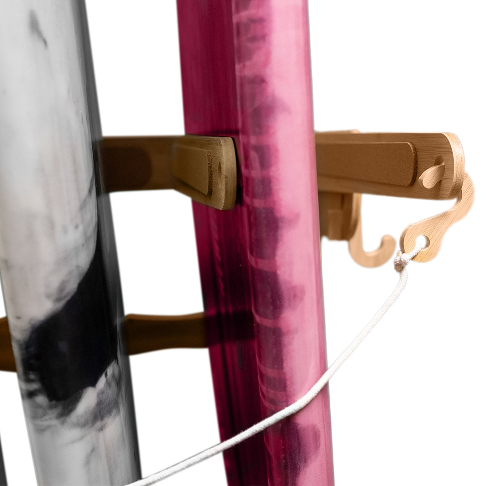 Close-up of the Spirit Rack's side showing the elastic security rope and built-in board spacing support.